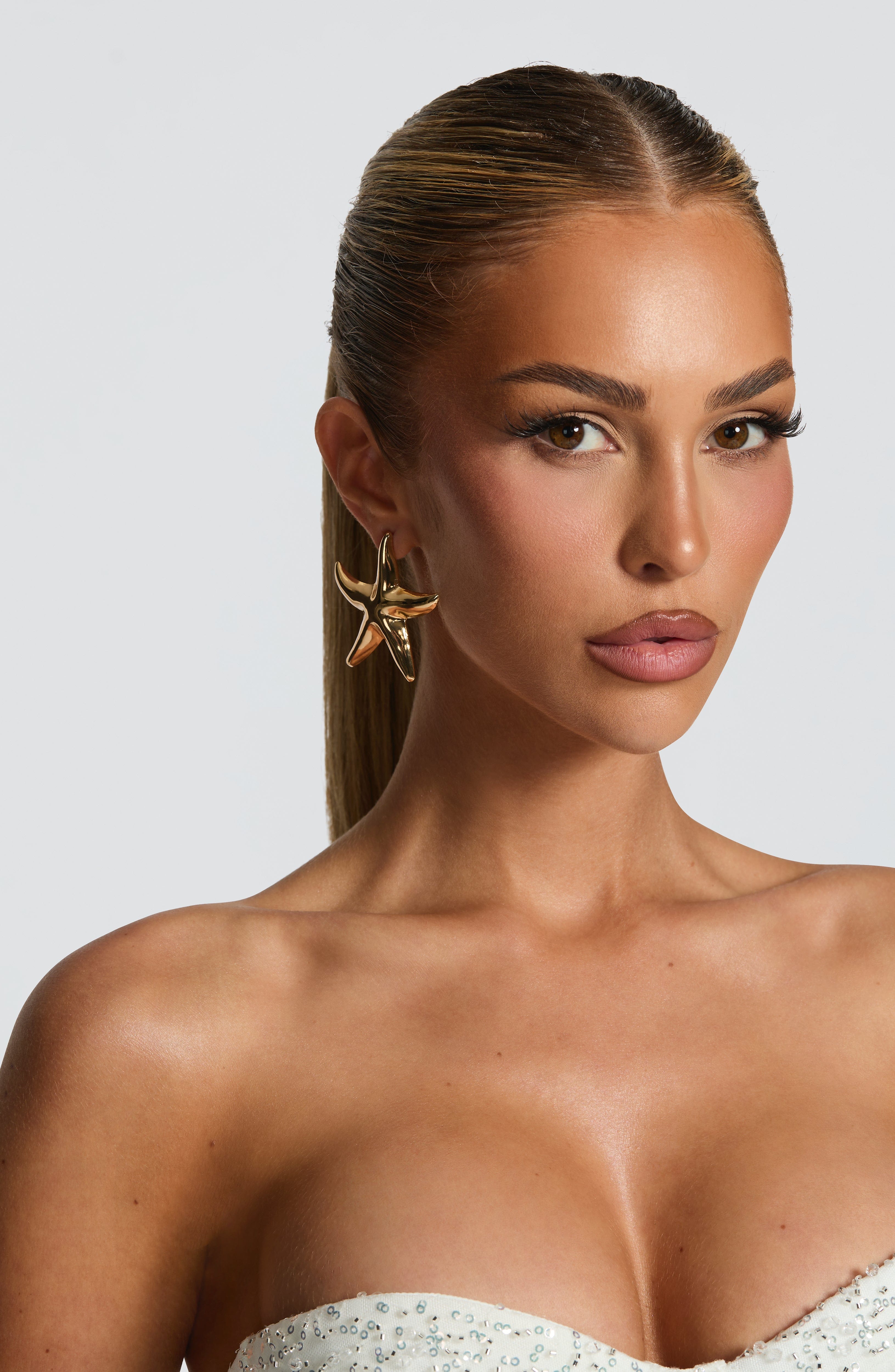 Flourenne Dakonna Earrings in Gold